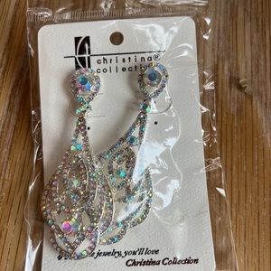 These are long very pretty earrings brand new in packaging